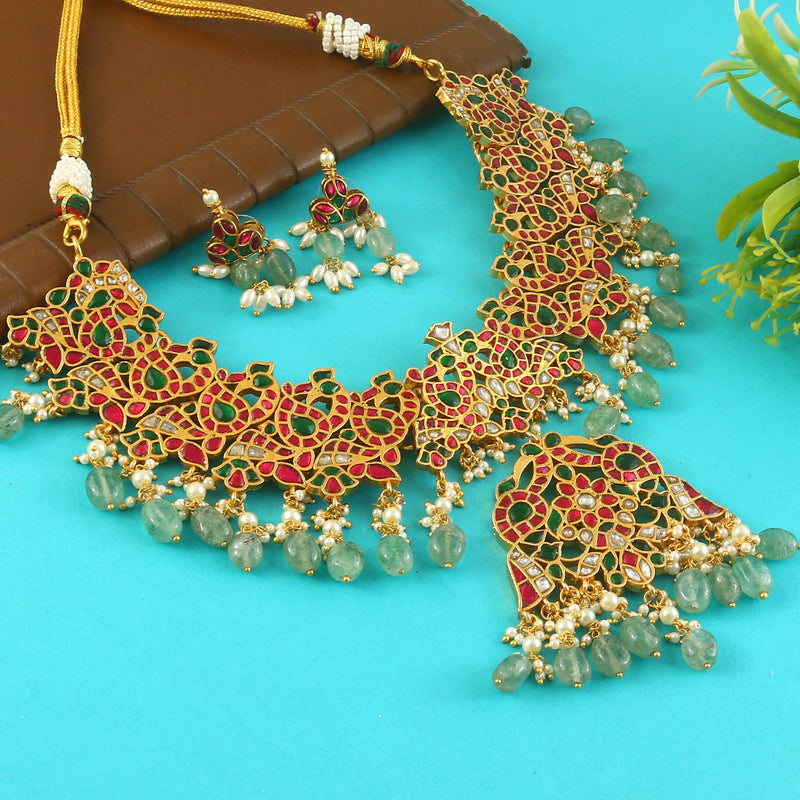 Jadau Kundan Necklace Set is beautifully handcrafted with premium Kundan stones in a classic Jadau setting. Inspired by the royal
