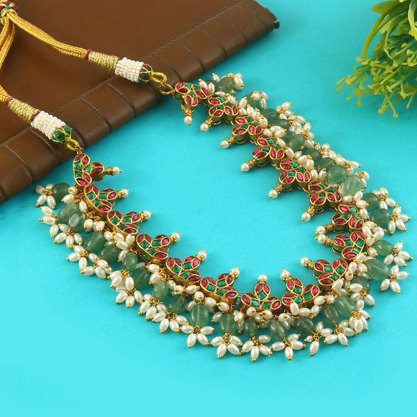 Jadau Kundan Necklace Set is beautifully handcrafted with premium Kundan stones in a classic Jadau setting. Inspired by the royal