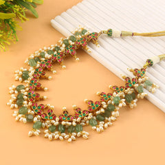 Jadau Kundan Necklace Set is beautifully handcrafted with premium Kundan stones in a classic Jadau setting. Inspired by the royal