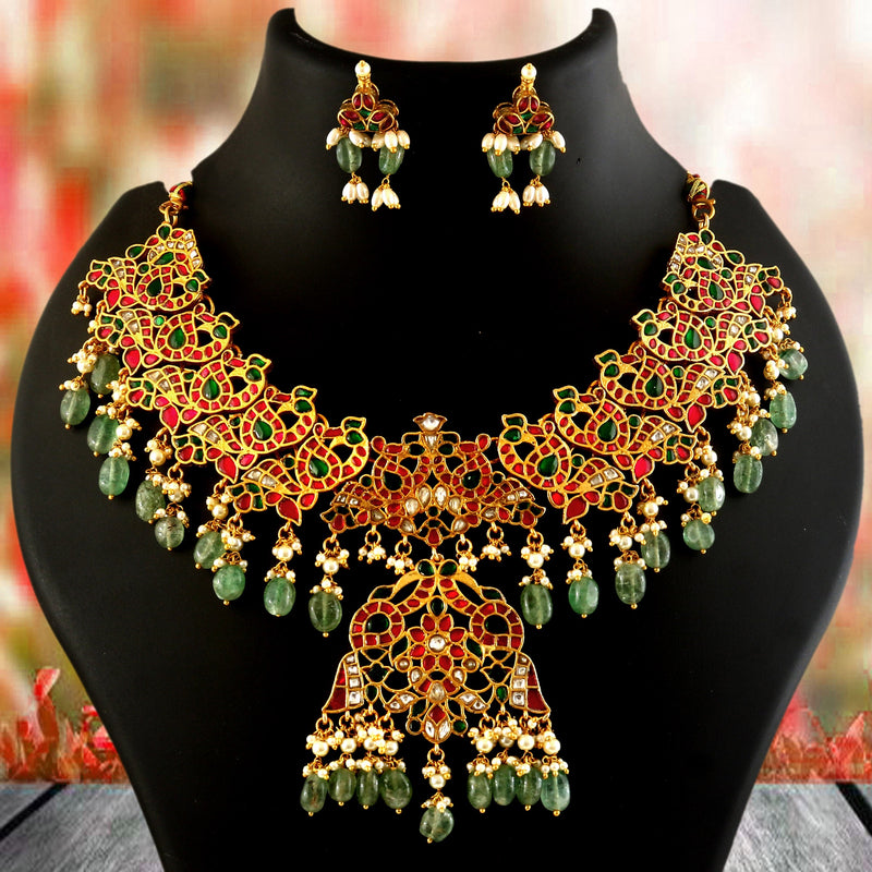 Jadau Kundan Necklace Set is beautifully handcrafted with premium Kundan stones in a classic Jadau setting. Inspired by the royal