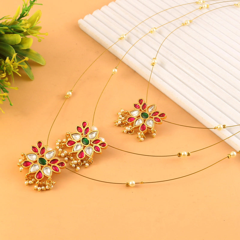 Jadau Kundan Necklace Set is beautifully handcrafted with premium Kundan stones in a classic Jadau setting. Inspired by the royal