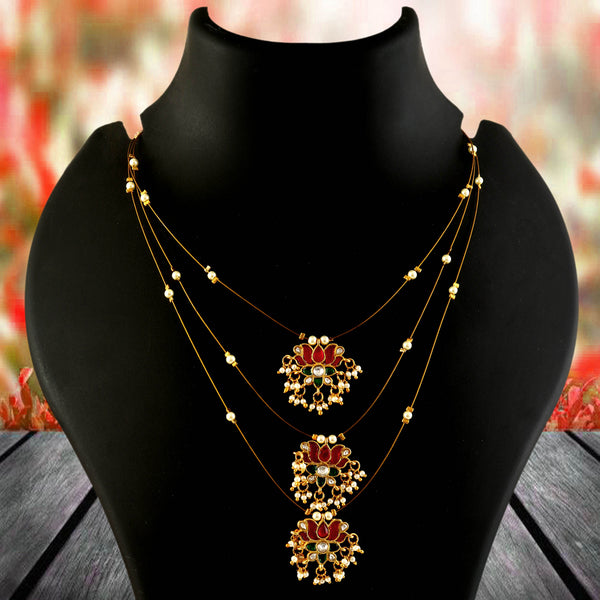 Jadau Kundan Necklace Set is beautifully handcrafted with premium Kundan stones in a classic Jadau setting. Inspired by the royal