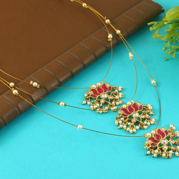 Jadau Kundan Necklace Set is beautifully handcrafted with premium Kundan stones in a classic Jadau setting. Inspired by the royal