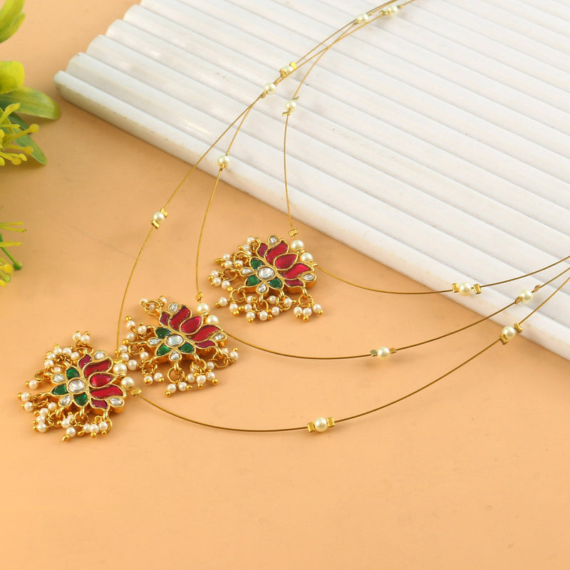 Jadau Kundan Necklace Set is beautifully handcrafted with premium Kundan stones in a classic Jadau setting. Inspired by the royal