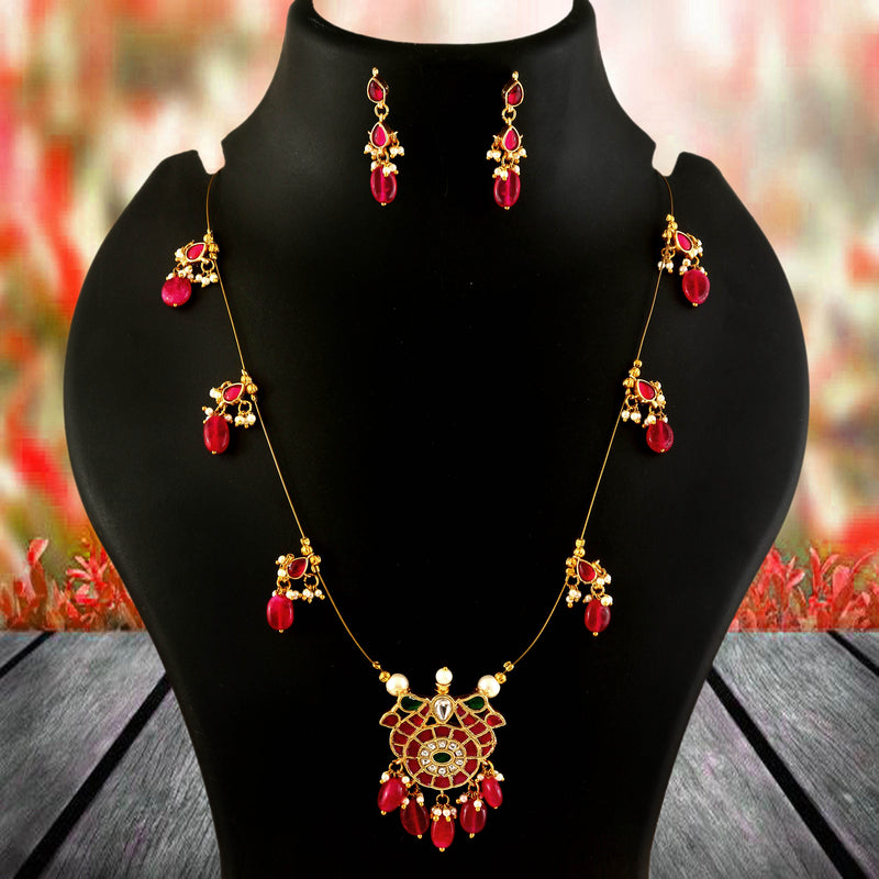 Jadau Kundan Necklace Set is beautifully handcrafted with premium Kundan stones in a classic Jadau setting. Inspired by the royal