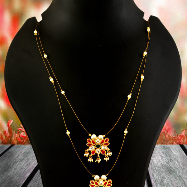 Jadau Kundan Necklace Set is beautifully handcrafted with premium Kundan