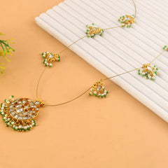 Jadau Kundan Necklace Set is beautifully handcrafted with premium Kundan