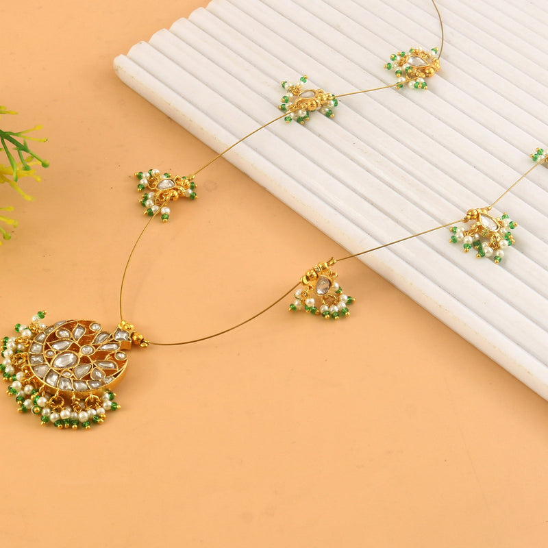 Jadau Kundan Necklace Set is beautifully handcrafted with premium Kundan