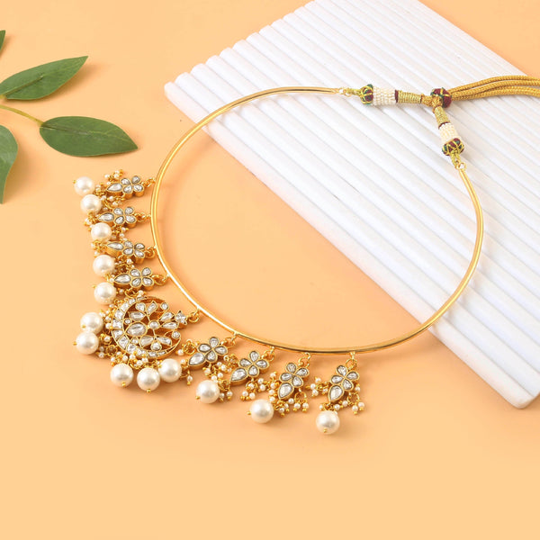 Gold polki and kundan embellished necklace set