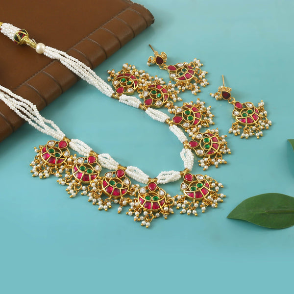 Pendant necklace featuring a charm chain